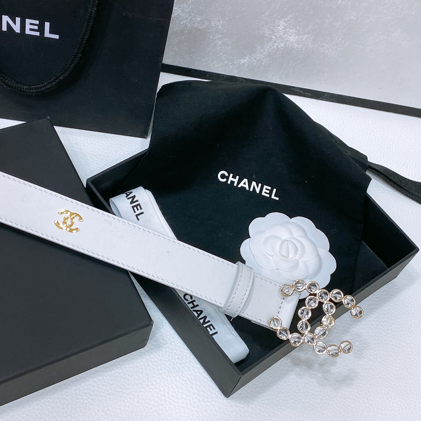 Chanel-Flat leather belt with cowhide pattern