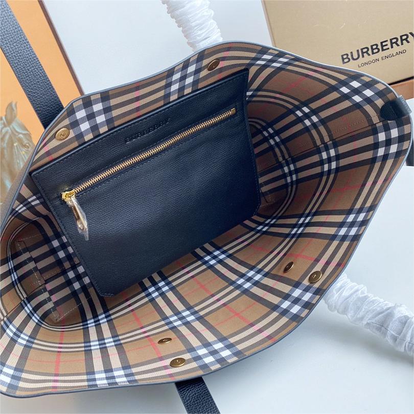 Burberry-Embossed badge leather tote bag