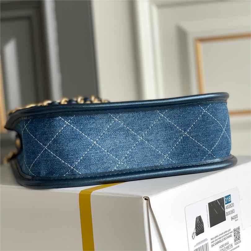 Chanel-Hippie bag washed with denim and gold metallic blue