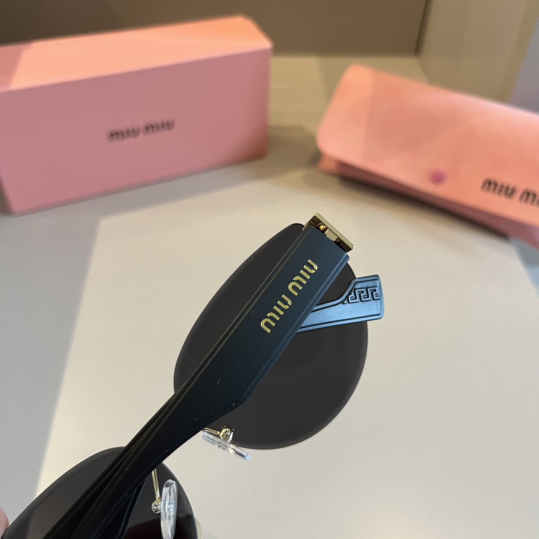 MiuMiu- New frameless Sunglasses