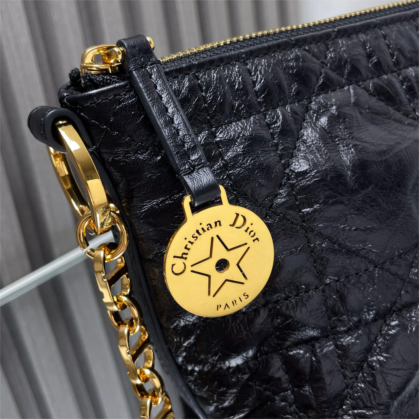 Dior-Hobo chain handbag in black pleated cowhide leather