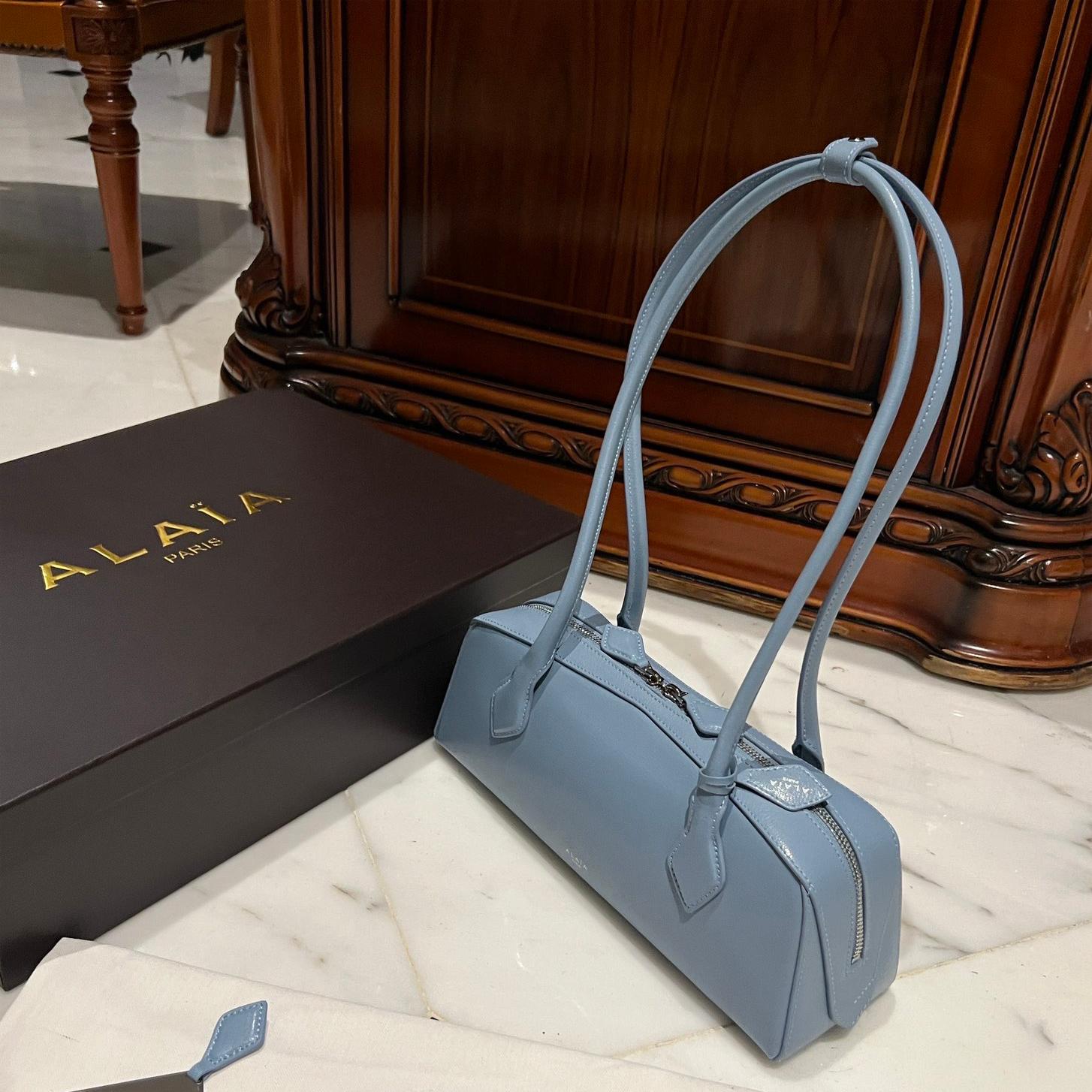 LIAIA-LE TECKEL SMALL BAG IN GOATSKIN Light blue