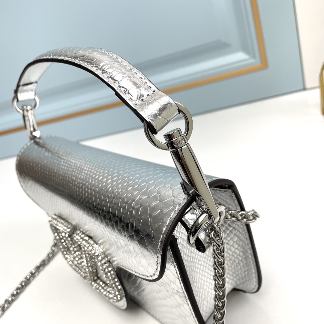 Valentino-Garavani MINI LOCÒ Snake patterned calf leather bag
