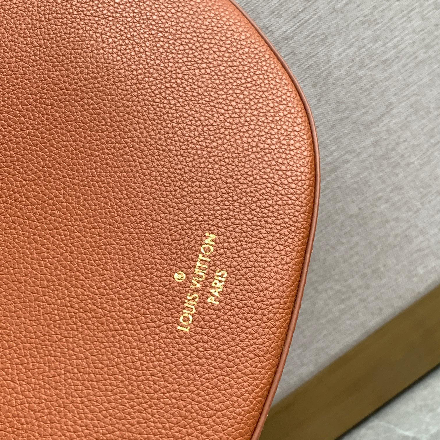 LV- low key leather bag