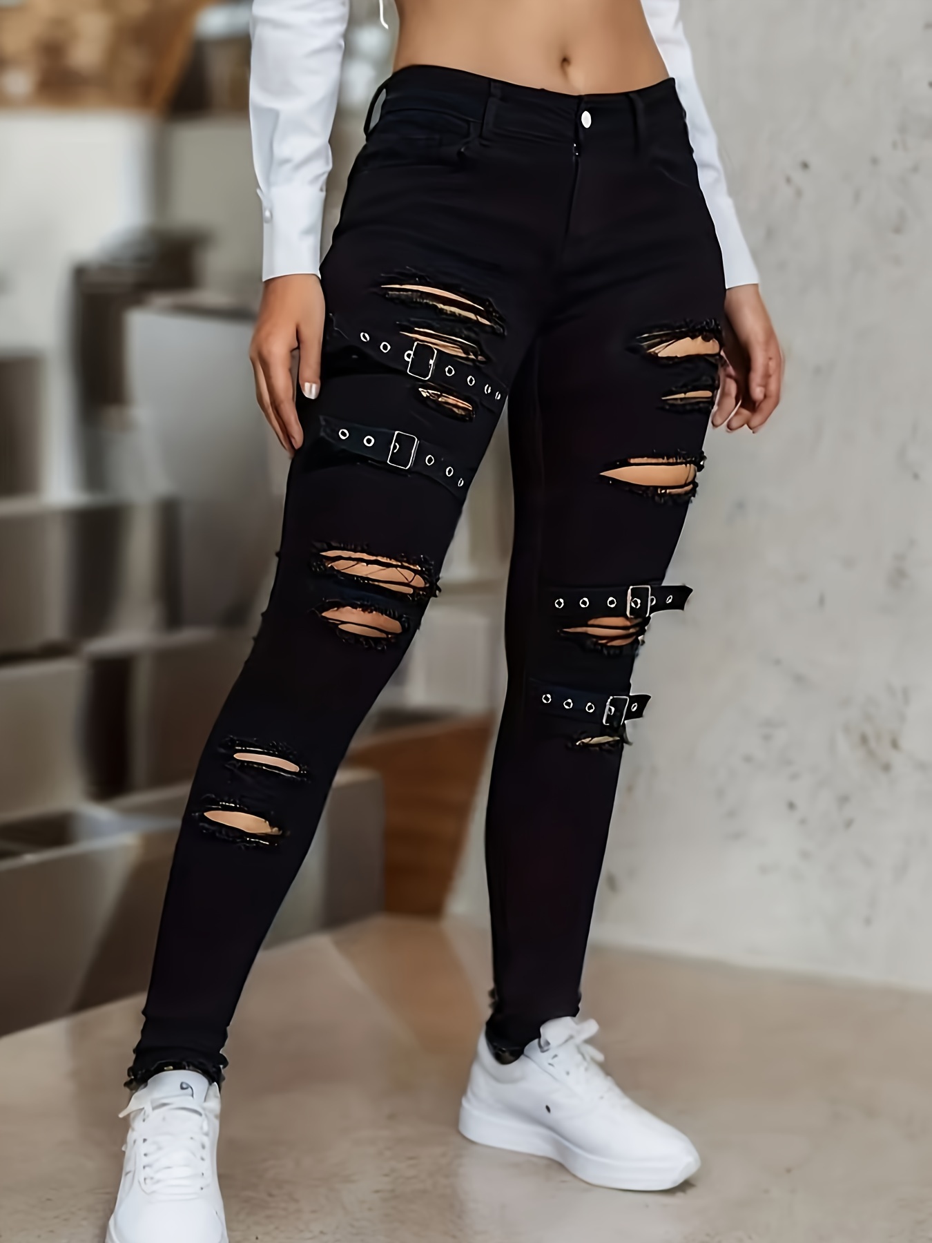Trendy High-Waisted Ripped Skinny Jeans - Distressed Black Denim Pants with Buckle Details, Street Style Design, Comfortable Stretch Fabric, and Flattering Fit for Spring and Fall Seasons